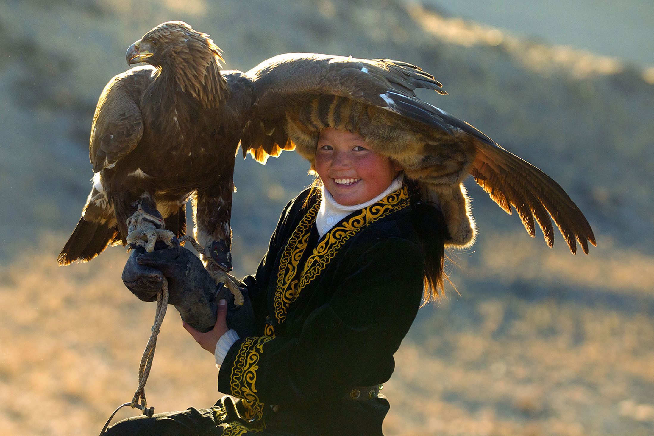 A Girl and Her Eagle Photos of an Ancient Hunting Tradition OutdoorHub