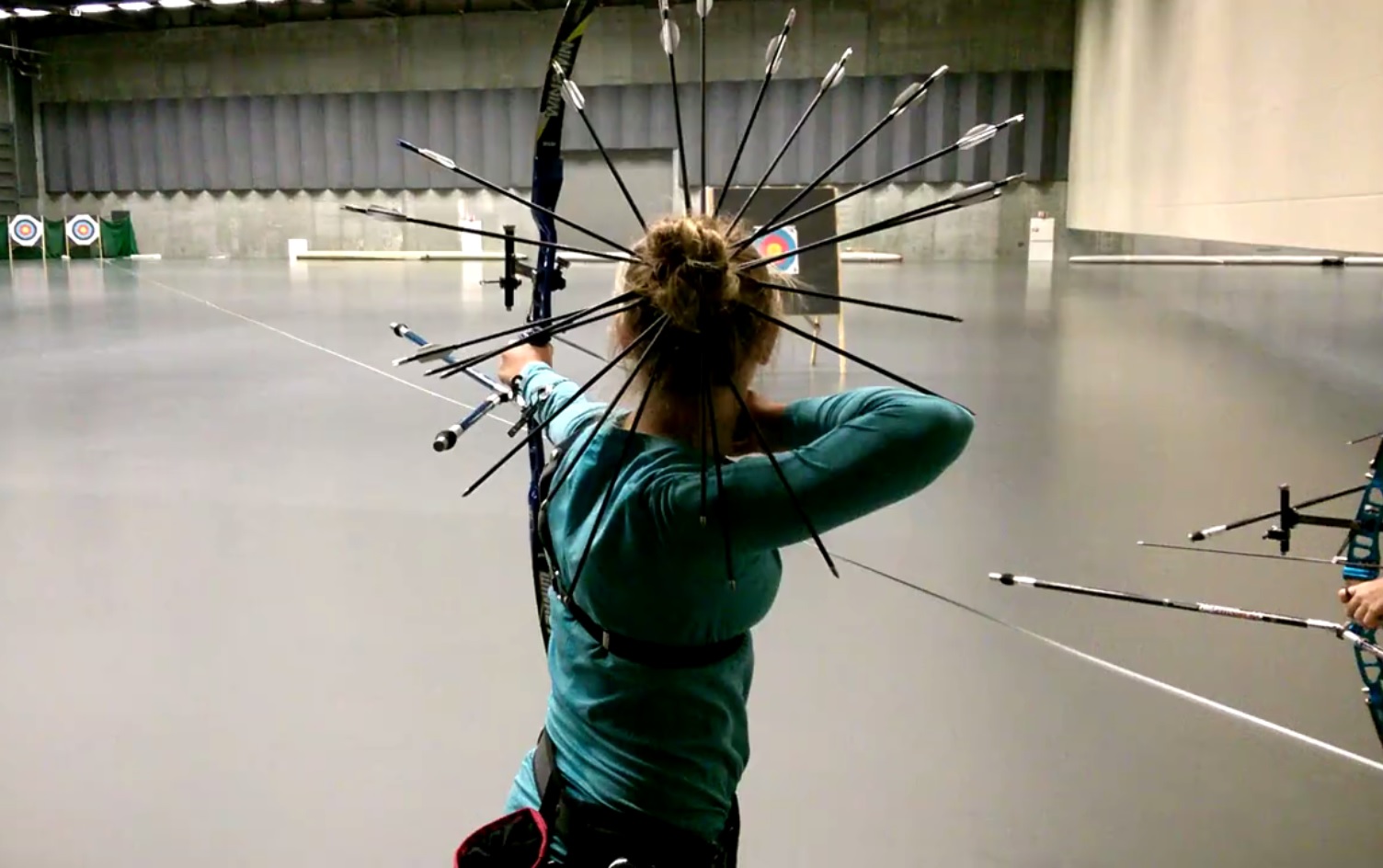 A young athlete from Stavanger Bueskyttere, a Norwegian archery team, decid...