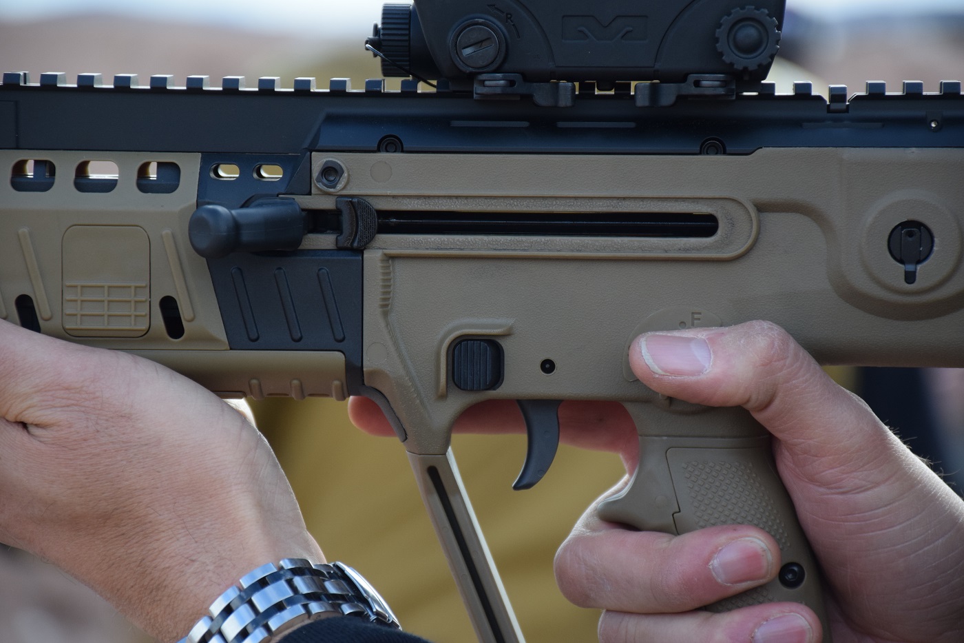 The X95 features an ambidextrous, AR-style magazine release ahead and above...