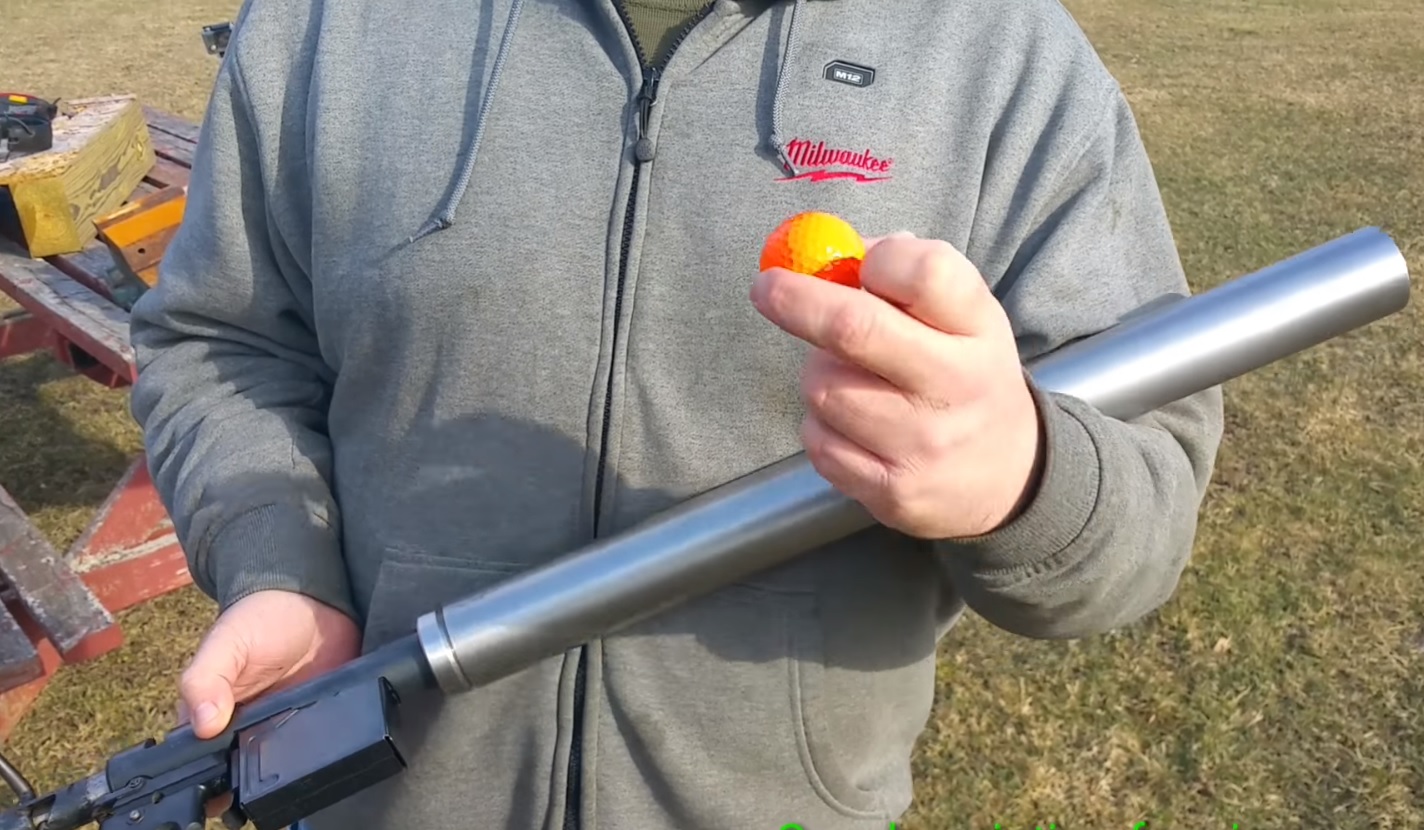 Homemade golf ball cannon at a local gun show by SaberFox2375