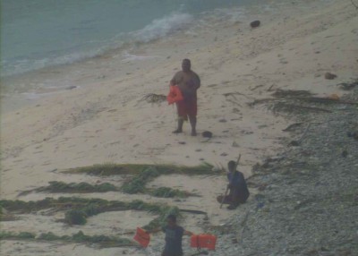 Stranded Fishermen Rescued After Writing "Help" On Beach | OutdoorHub