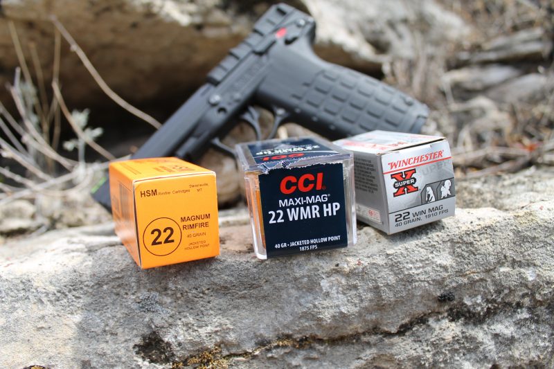 22 Magnum ammo with the Kel-Tec PMR-30 in background