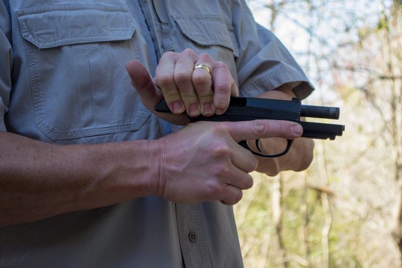 Will you have both hands available to draw your handgun and rack the slide?