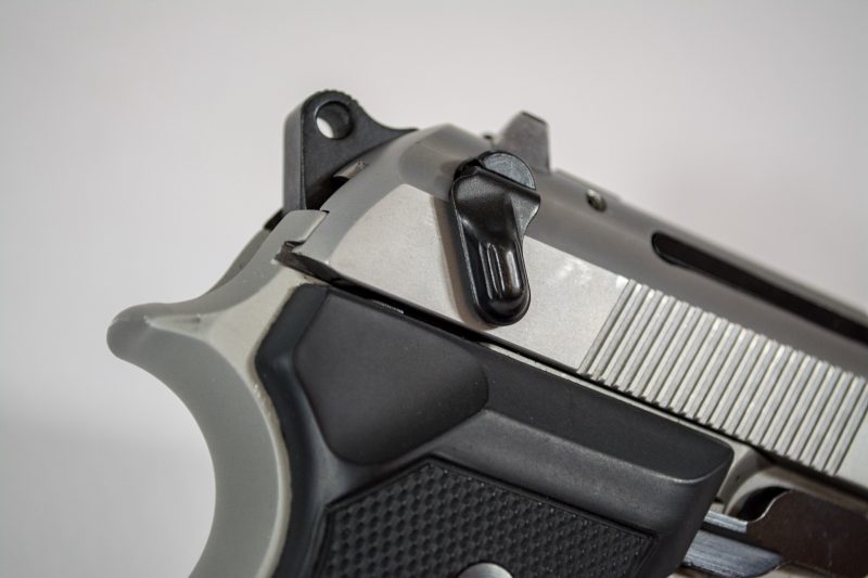The de-cocker / safety lever on this Beretta 92 FS Compact is an additional layer of "safety" for carrying a chambered round. 