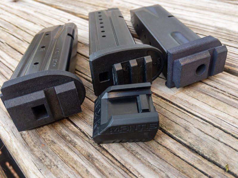Mantis offers a wide variety of replacement magazine base plates for mounting. The one in the center is a universal model that sticks on any magazine.
