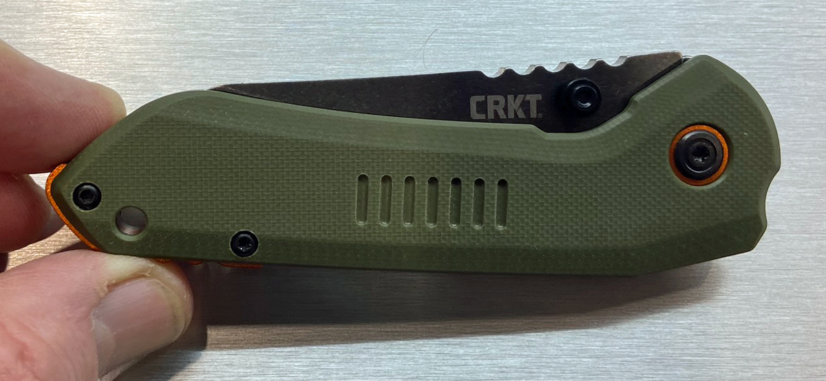 CRKT Overland has a G10 scale on one side.