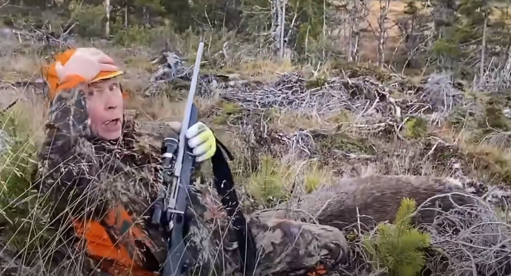 Hunter Drops Charging Moose