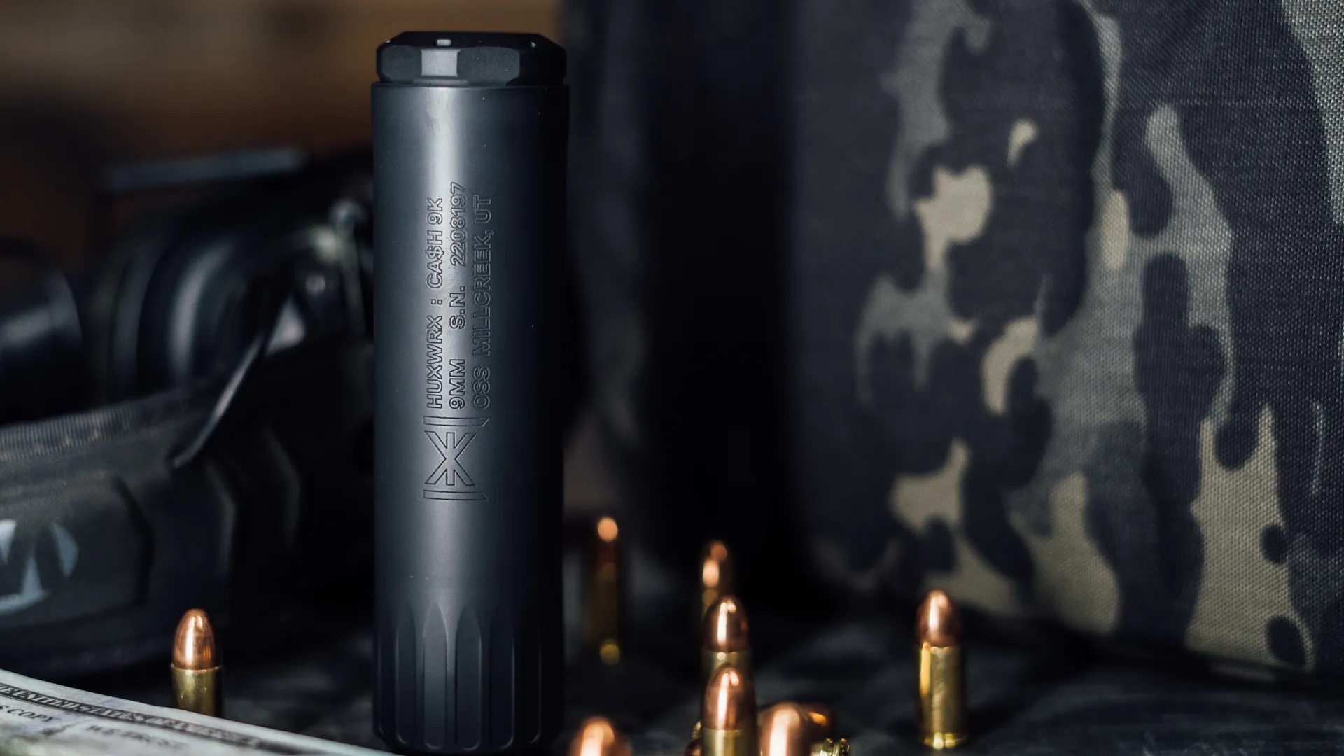 The CA$H 9K (CASH 9K) 9mm Suppressor from HUXWRX