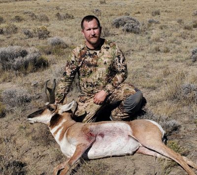 The author with his first muzzleloader antelope after a long search.
