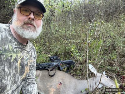 josh centers with deer he shot with the Barnett Wildcat CRX